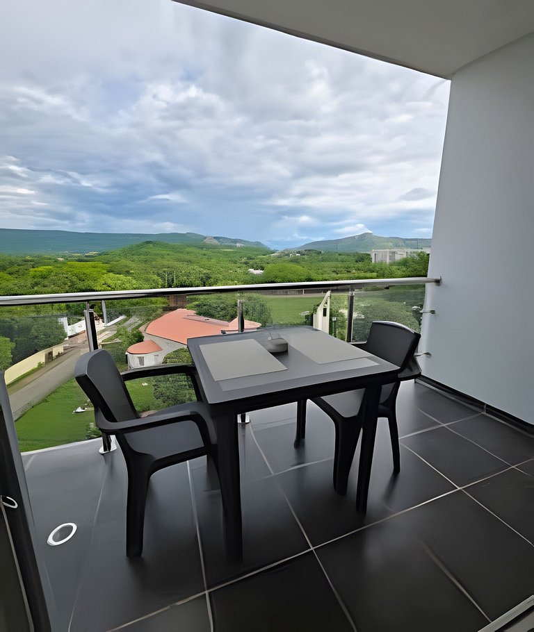 Loft acogedor con vista, piscina y balcón